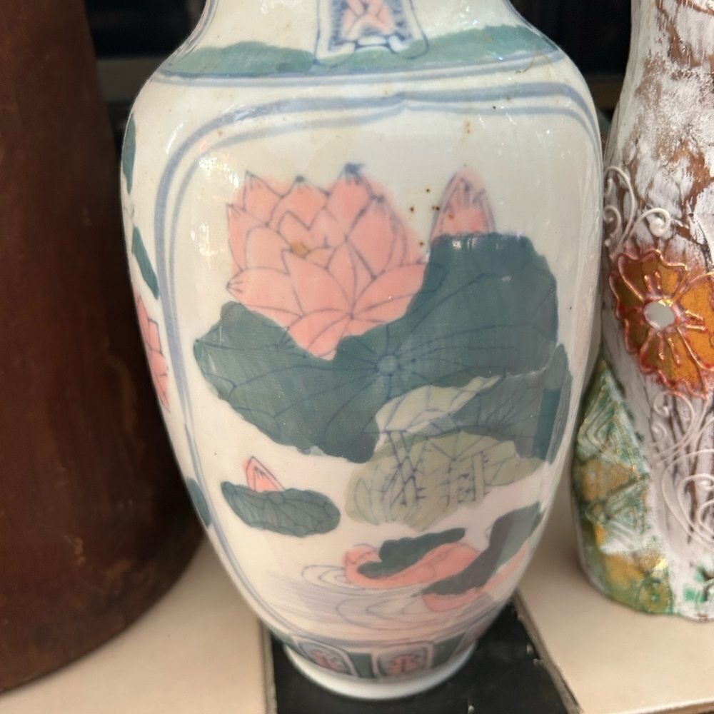 Vintage Asian vase with lotus flowers and butterflies home